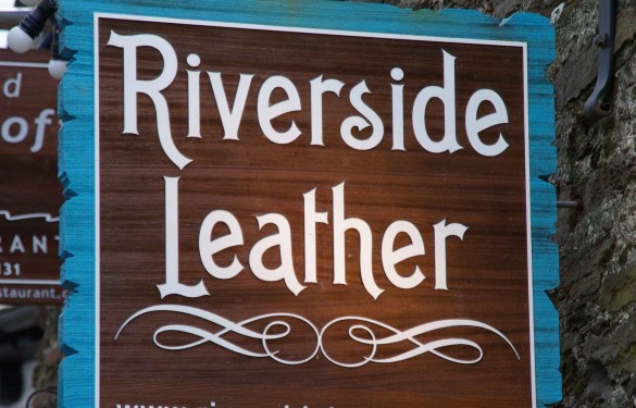 riverside leather -hanging sandblasted sign- display retail sign - the grain