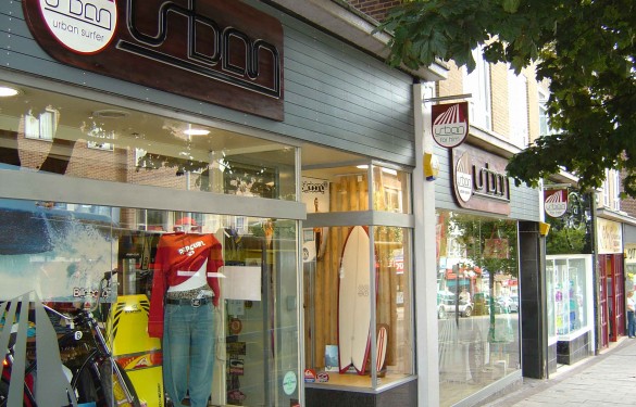 urban surfer surfshop - the grain - wooden retail shop sign - surf shop logo